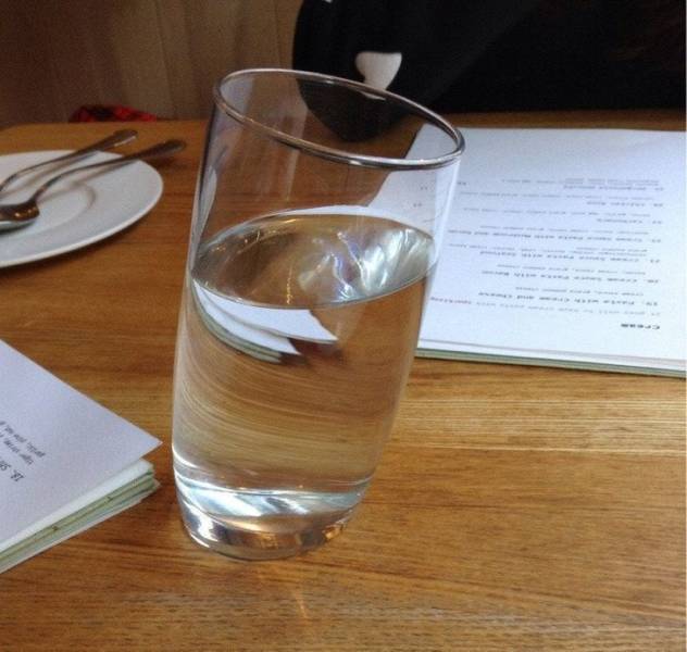 “This restaurant has tilted glasses.”