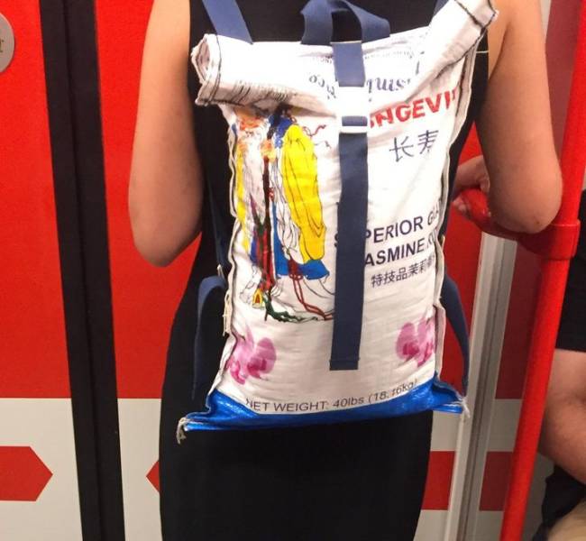 “This woman has a backpack made from a rice bag.”