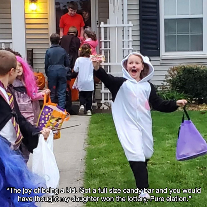 wholesome pics - costume - The joy of being a kid. Got a full size candy bar and you would have thought my daughter won the lottery. Pure elation."