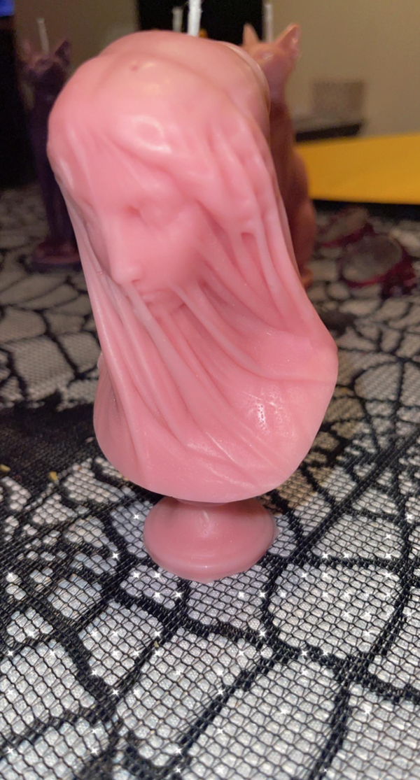 “Ocean Rose Veiled Woman candle that I made for my store.”