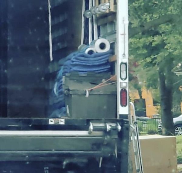 This stack of towels and rolls looks like Cookie Monster.