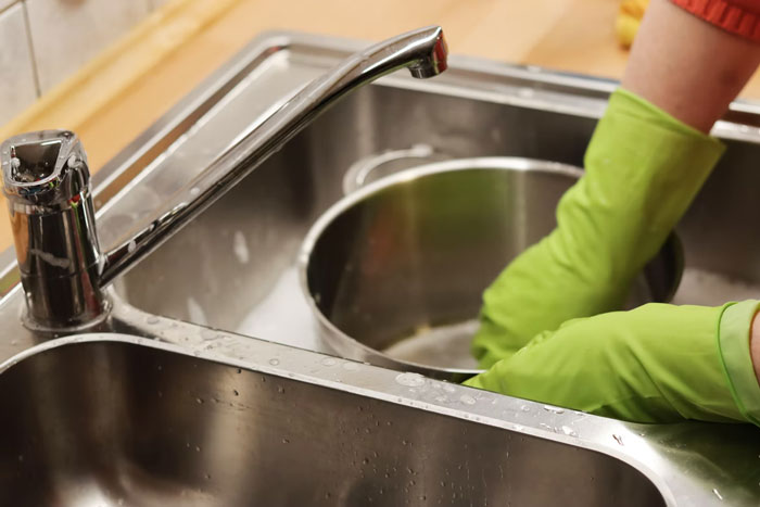 Wash dishes/pots/pans as you finish with them and never go to bed leaving anything in the sink that is dirty. Helps keep the kitchen so clean.