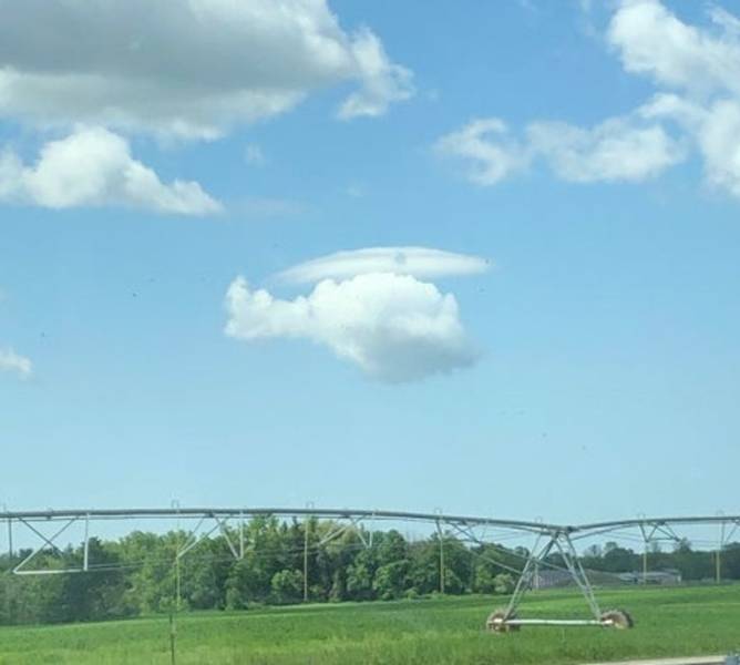 “I saw a lenticular cloud over a cumulus cloud that made it look like a helicopter.”