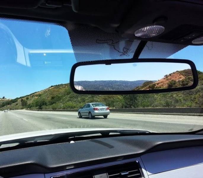 “Took this picture going 70 mph and everything in the rearview mirror matches the landscape of the foreground.”