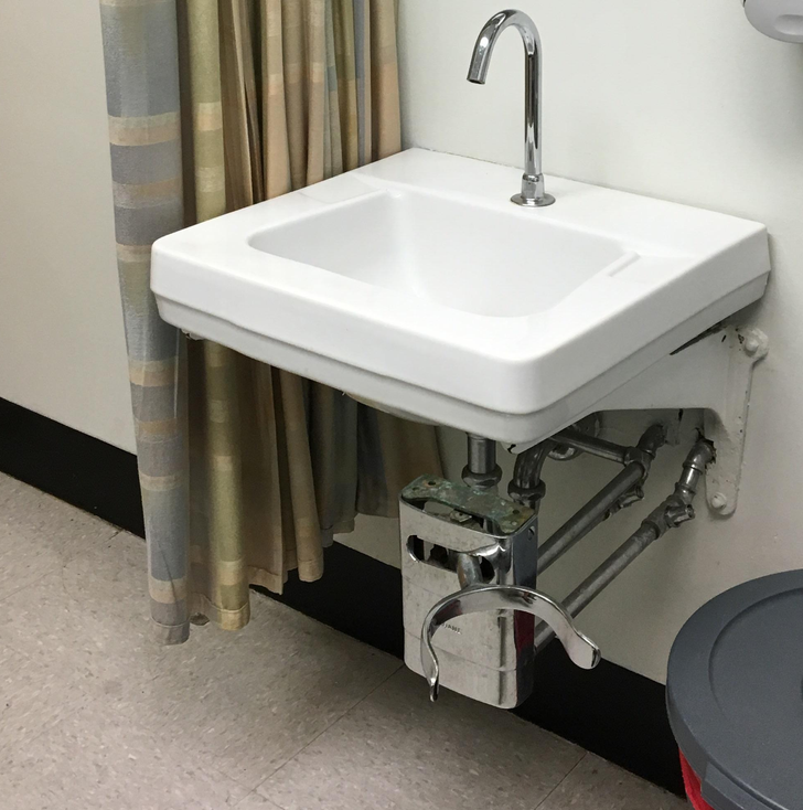 “A hospital sink is operated with clever knee apparatus instead of hand knobs.”