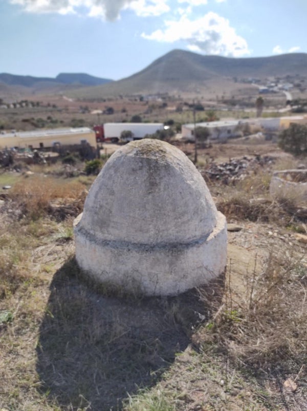 What are these solid white domes of varying sizes the one pictured here is about a meter high and meter wide though some were bigger. Found all over the Andalusian region of Spain. They’re solid with no openings and seem to be made of some sort of solid rendered material maybe concrete.

A: Lots of European countries have things like these as tank-deterrents left over from WW2.