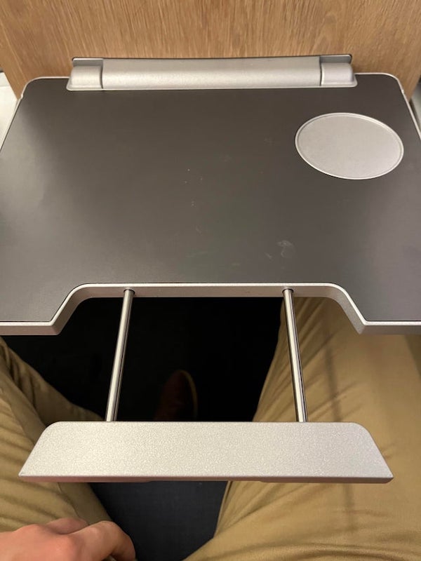 Found this on a train in Sweden, you can pull it out an push it in to the table in front of your seat.

A: It’s an extender e.g. for big laptops.