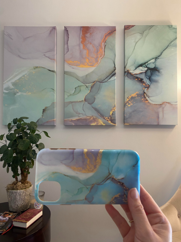 “This painting in a waiting room is the same print as my phone case”