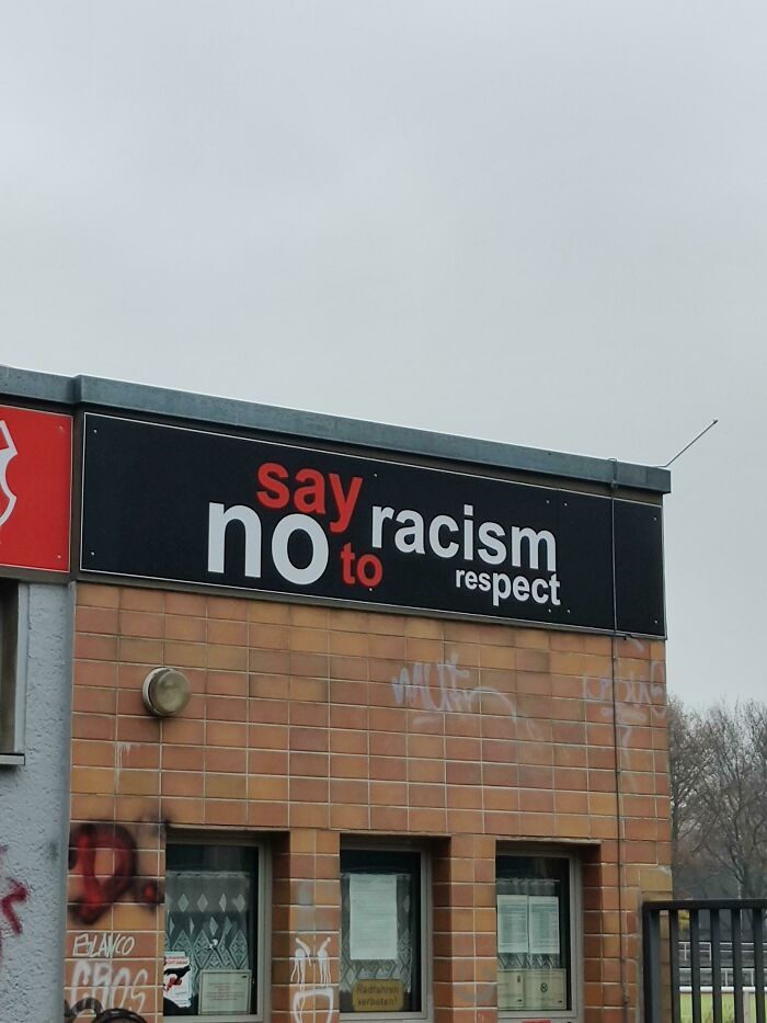 funny signs- facade - sa racism no respect Elanco Cras Rad