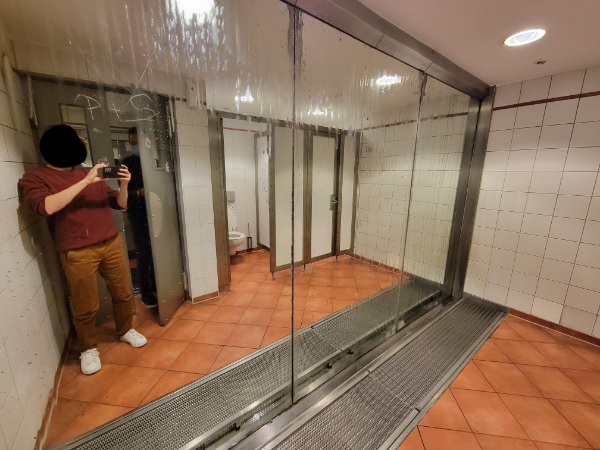 “A urinal in Germany with a full length mirror for inspecting other dude’s junk.”