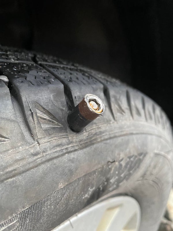 Unsure what this thing is that’s sticking out of my tire? It’s small, about the size of a battery. Looks like maybe it has a drill bit or bullet?? It’s letting air out of the tire. CAA & family don’t know what it is either. We drove through a construction site but not sure if it’s from that?

The picture you provided is a 1/4” driver. The OP has a 1/4” bit holder in their tire. Complete with a sleeve to hold the fastener in place for those who don’t screw good.