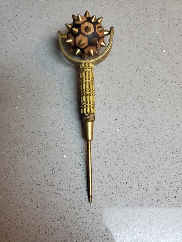 Found at rummage sale. About the size of pen in length. Tip on end is spring loaded but doesn’t act like a punch. Cork like ball that spins. Engraving on side includes a sun with squiggles. Novelty or functional?

It’s a massage/sensory/acupressure spring needle roller