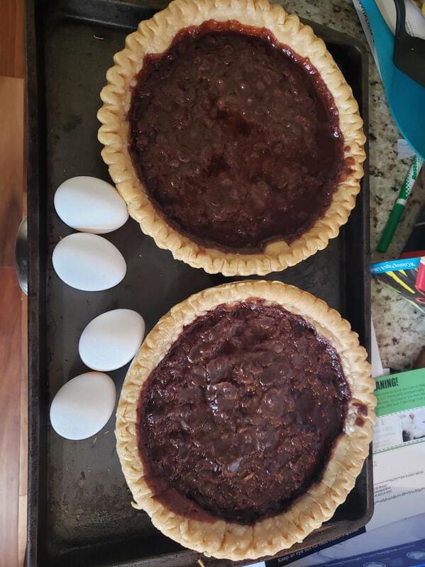 “See those eggs? They are supposed to be in the pies. I made two hot oily chocolate garbage circles.”