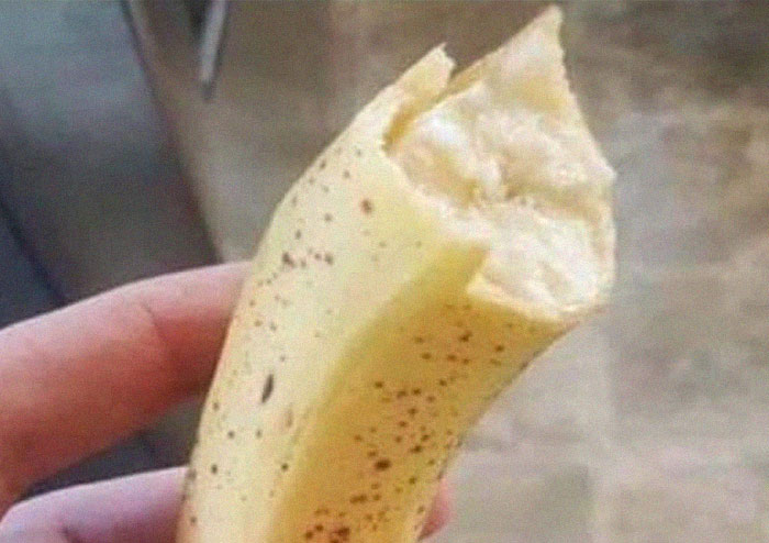 Eating a banana with the skin on