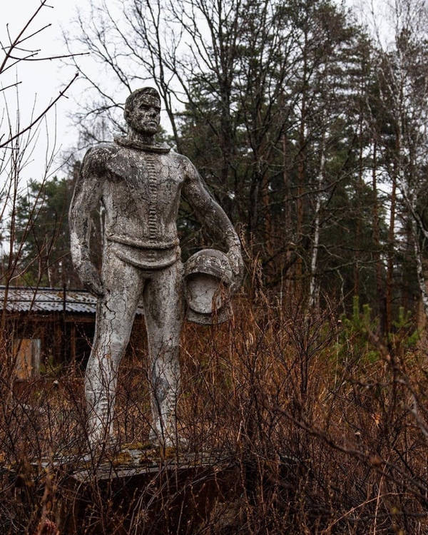 "Abandoned statue of a cosmonaut"