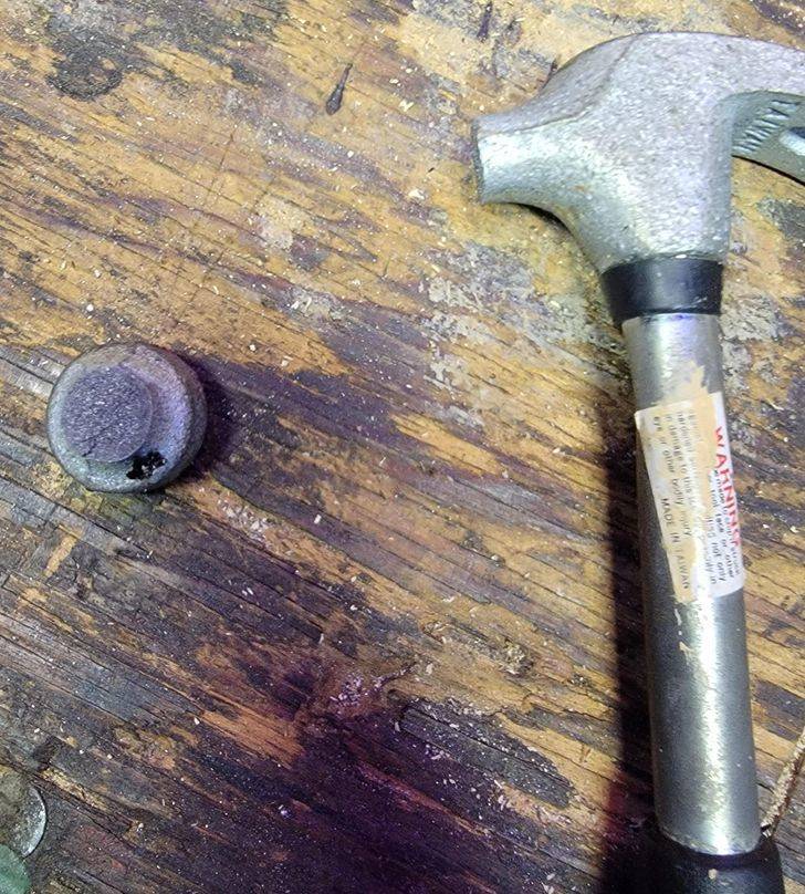 “My hammer broke when I hit a nail on some workbench trim.”