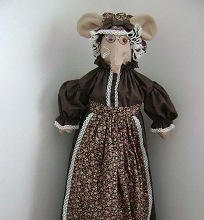 My grandparents have had a human-sized mouse on their stairs for as long as I can remember. It has a bonnet and an apron and wears a long floral dress and I’ve honestly got no idea where they got it from and why.