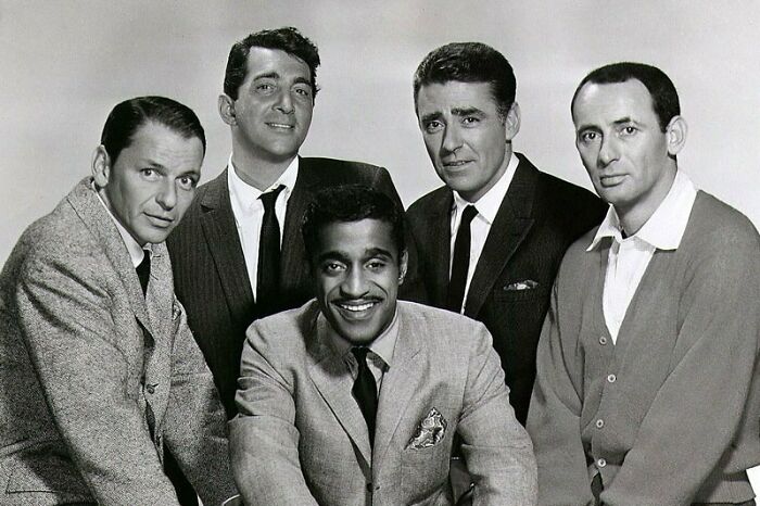 the Rat Pack were a group of entertainers who were friends in the 1950's. When one performed in Vegas, others would often come without an official booking and perform at the first one's show. Hotel marquees would read "Dean Martin, Maybe Frank (Sinatra), Maybe Sammy (Davis, Jr.)”