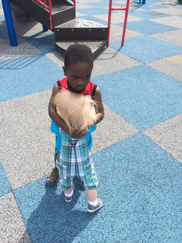 My son likes to randomly hug other children at playgrounds. This kid’s face….