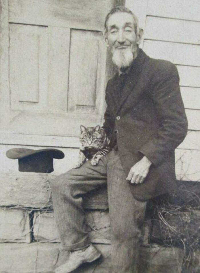 Historical Photos  - A Man With His Cat, Early 1900s