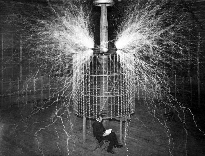 Nikola Tesla sitting in his Colorado Springs laboratory, 1899