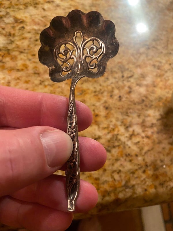 What is this diminutive silver table service utensil?

A: It’s a bon bon spoon.