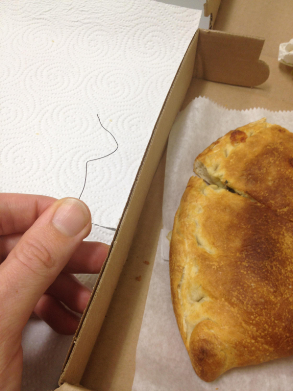“Second bite into my calzone and I find the metal wire from a twist-tie.”