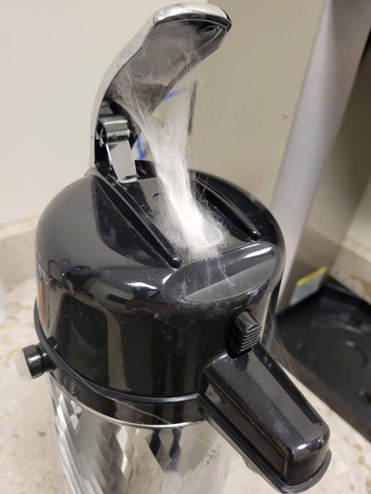 “Our office stays mostly empty these days, but I popped in today and made some coffee. After it brewed, I lifted the pump lever and found this.”