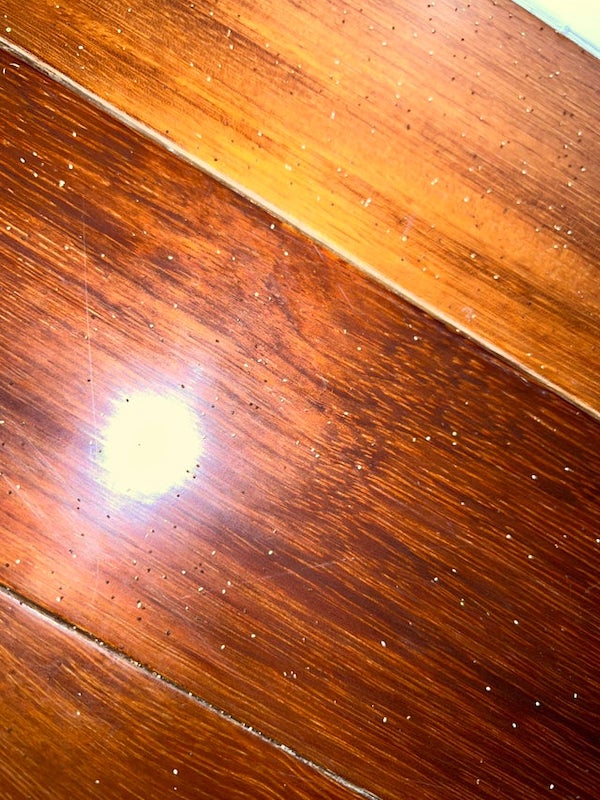 What is this grain-like substance that keeps appearing on my floor?

A: Termite castings.