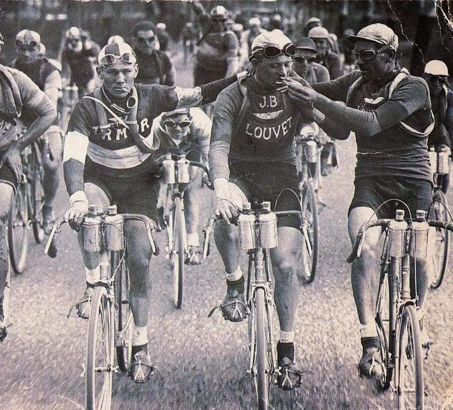 Sharing a cigarette during the Tour de France, 1920