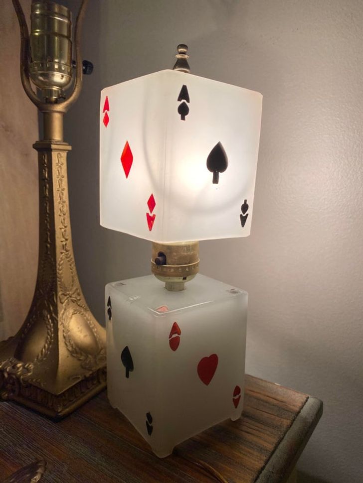 “Found this 1930s Art Deco milk glass ace lamp at the thrift store.”