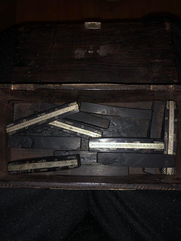 An old wooden box with wooden planks with silver plates inside, anyone an idea?

A: It’s typically used for incense in Saudi households.