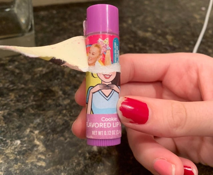 “I peeled back the packaging on my Barbie themed tube of lip balm and discovered the packaging of a different brand underneath.”