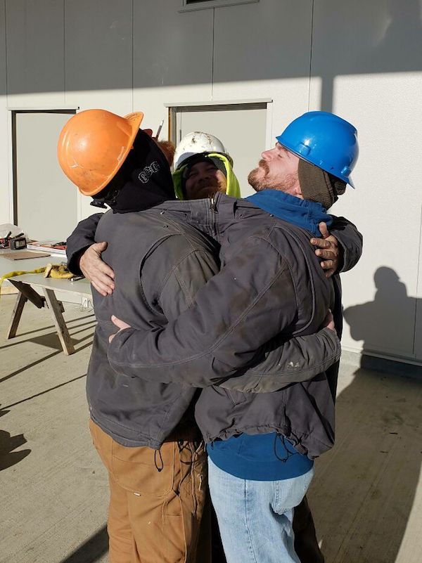 office pranks - construction workers hugging - 90