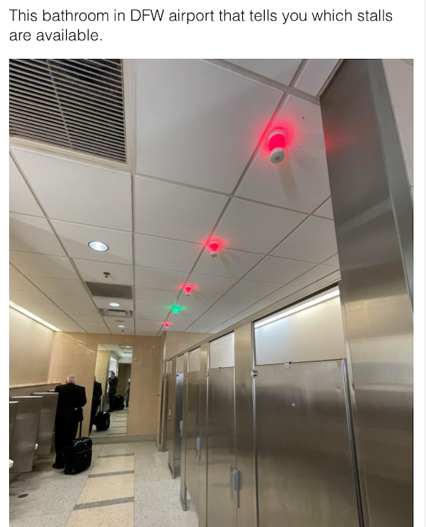 genius life hacks - ceiling - This bathroom in Dfw airport that tells you which stalls are available.