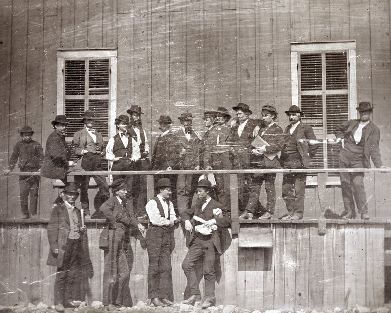 A group of men stands in front of Lynch’s Slave Market at 104 Locust Street. St. Louis, Missouri. 1852
