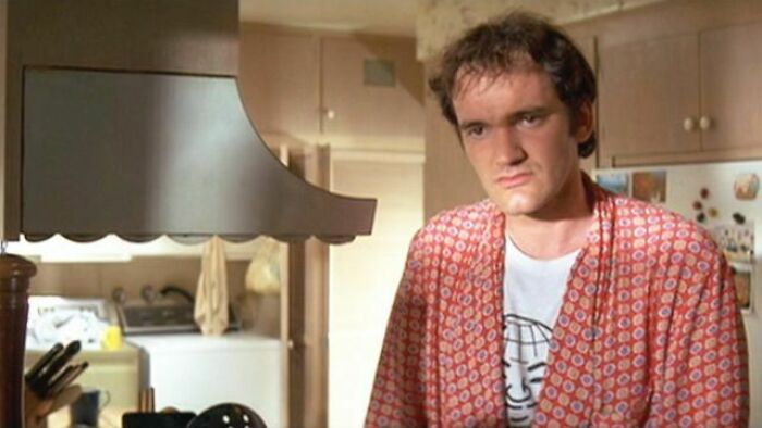 movie facts and details - In Pulp Fiction (1994) Tarantino's Smiling Globe T-Shirt Is For A Detroit Magazine Called Orbit
