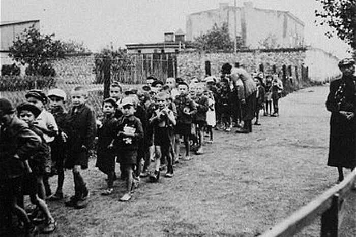 of the Lodz Ghetto, where at one point 20000 'useless eaters', mainly children under 10, were rounded up and taken away from their families to be exterminated. Many parents committed suicide.