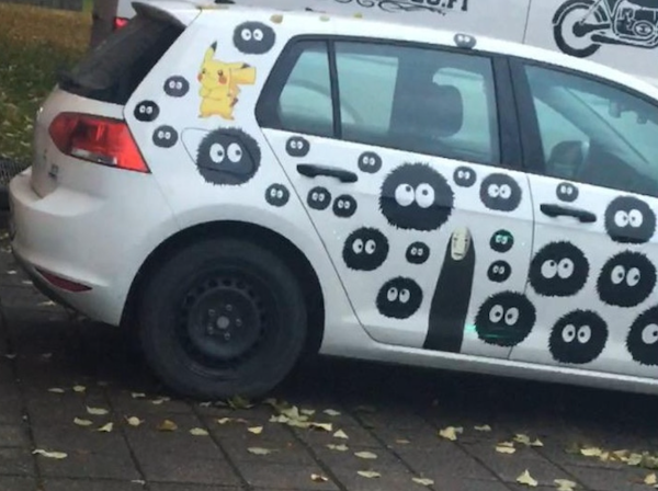 randoms things amused and surprised - car covered in stickers