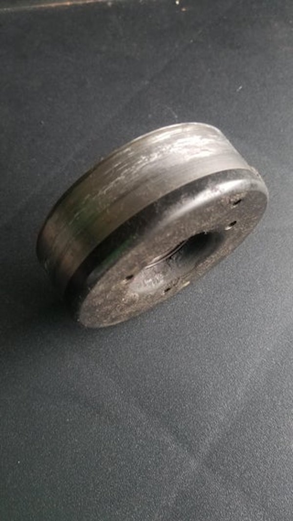 My oil change guy found this just lying on the bottom of my engine floor. It’s about 3″ in diameter and an inch tall. Do I need it?

A: Idler pulley for your serpentine belt, yes you need it.