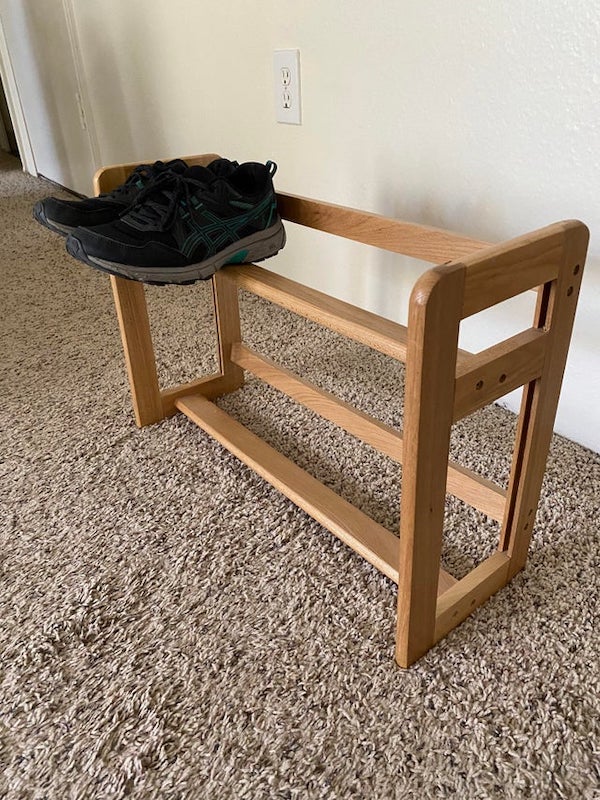 Bought this two-tiered wooden rack from a thrift store thinking it was to store shoes. Wasn’t until I got it home that I realized it’s ridiculously small for adult shoes. What is this supposed to be used for?

A: CD/DVD rack