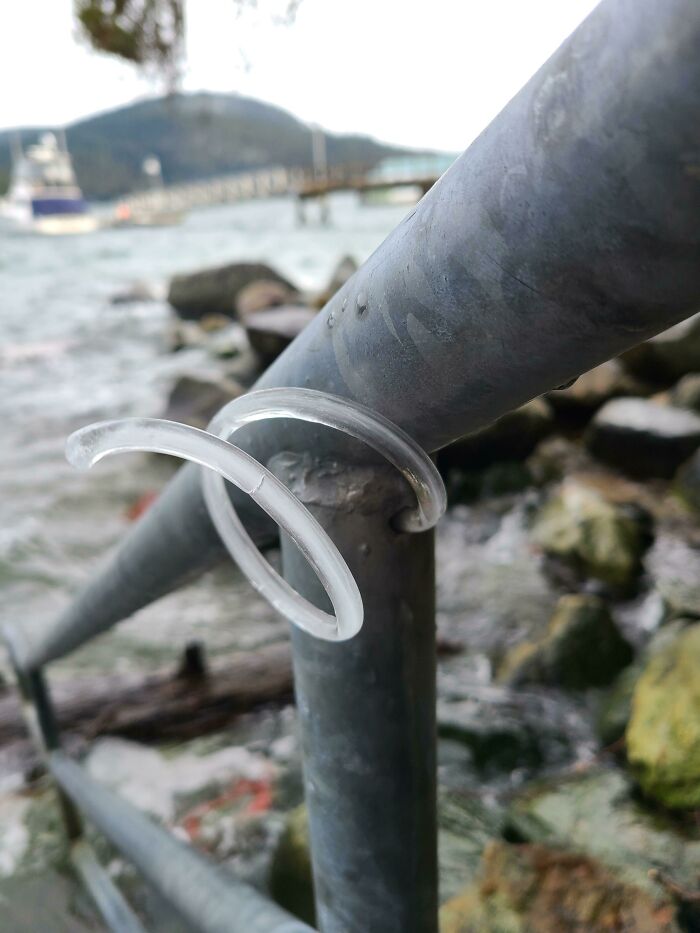 Ice Coming Out Of This Hole In A Hand Railing