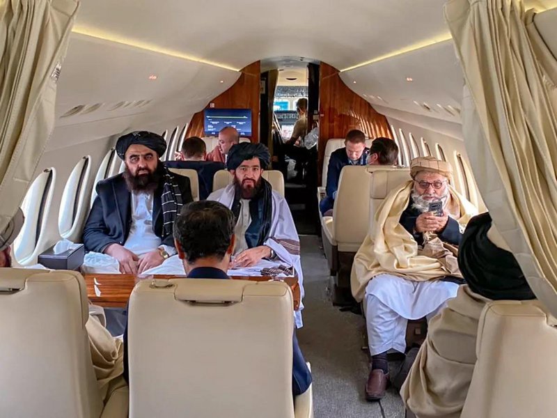 The Taliban delegation onboard a private jet on their way to Norway