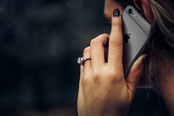 dark secrets - iphone with engagement ring