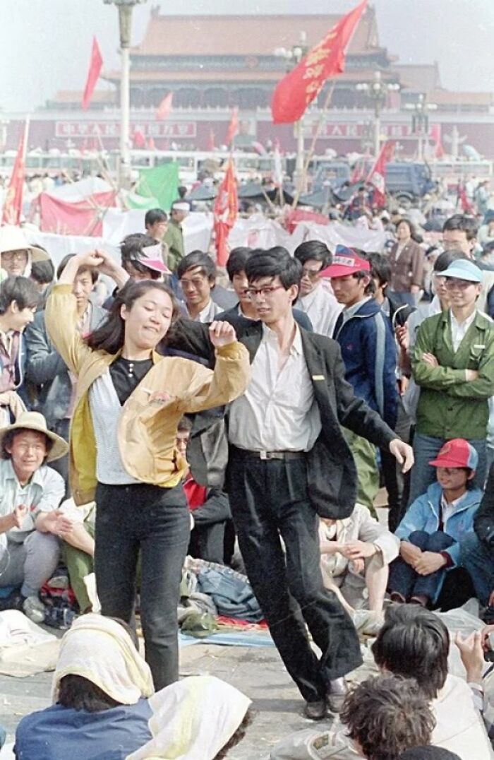 fascinating photos from history - Students Dance In Tiananmen Square Before The Arrival Of The Chinese Military, June 4th 1989