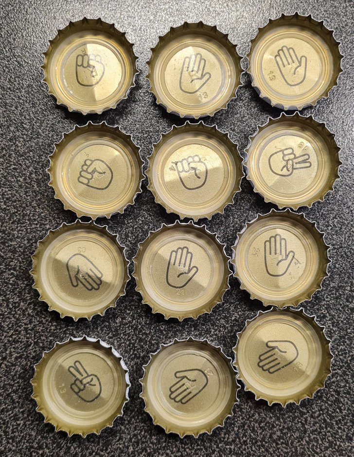 Beer caps that you can play rock paper scissors with