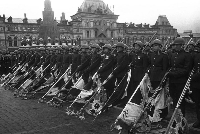 Soviet soldiers lowering the captured German standards during the Victory Day Parade. Kremlin Red Square,Moscow, USSR, 24 Jun 1945