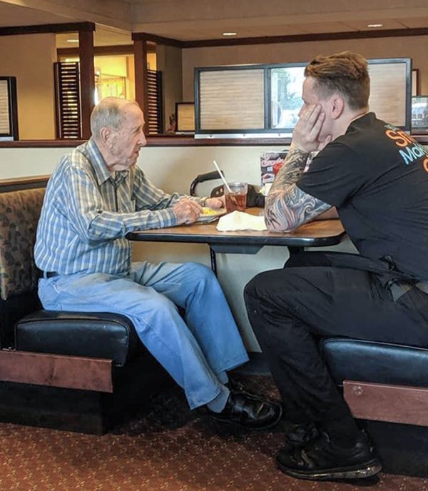 An older gentleman came in by himself to eat at a restaurant in PA. He was telling some stories to his server, who went on break and joined him during his meal.