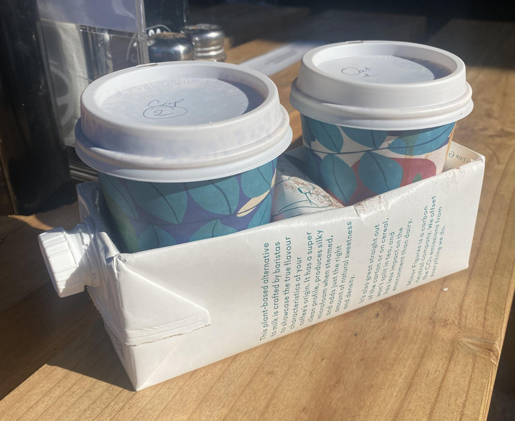 “A café in Anglesea, Victoria reusing milk cartons as cup trays”