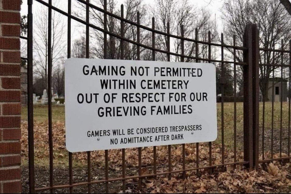 wtf pics  - gamers in cemetery - Gaming Not Permitted Within Cemetery Out Of Respect For Our Grieving Families Gamers Will Be Considered Trespassers No Admittance After Dark